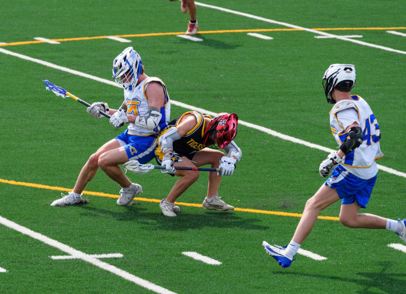 High School Lacrosse Stars Shine: Wheaton Academy Boys, York Girls Advance in State Tournaments