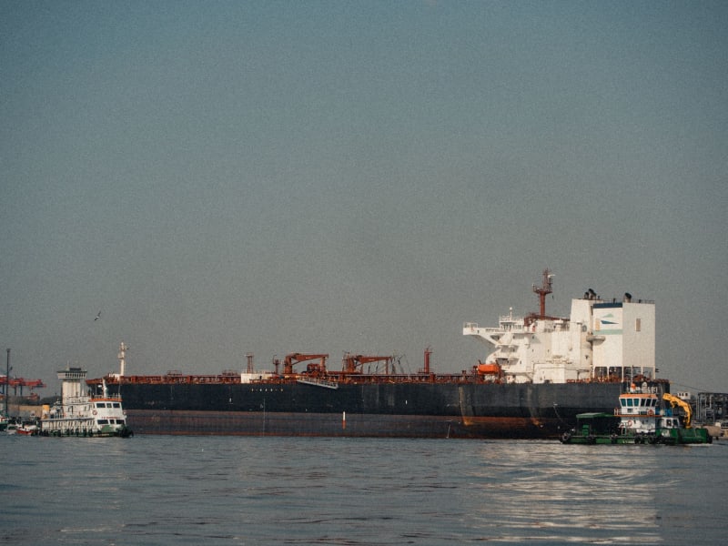 Escalating Tensions: Tanker Ablaze in Hormuz Strait After Projectile Strike Off Oman
