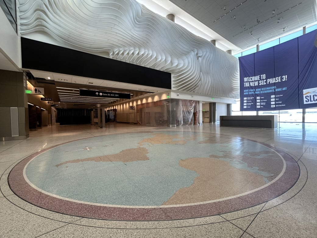 World map on airport floor.