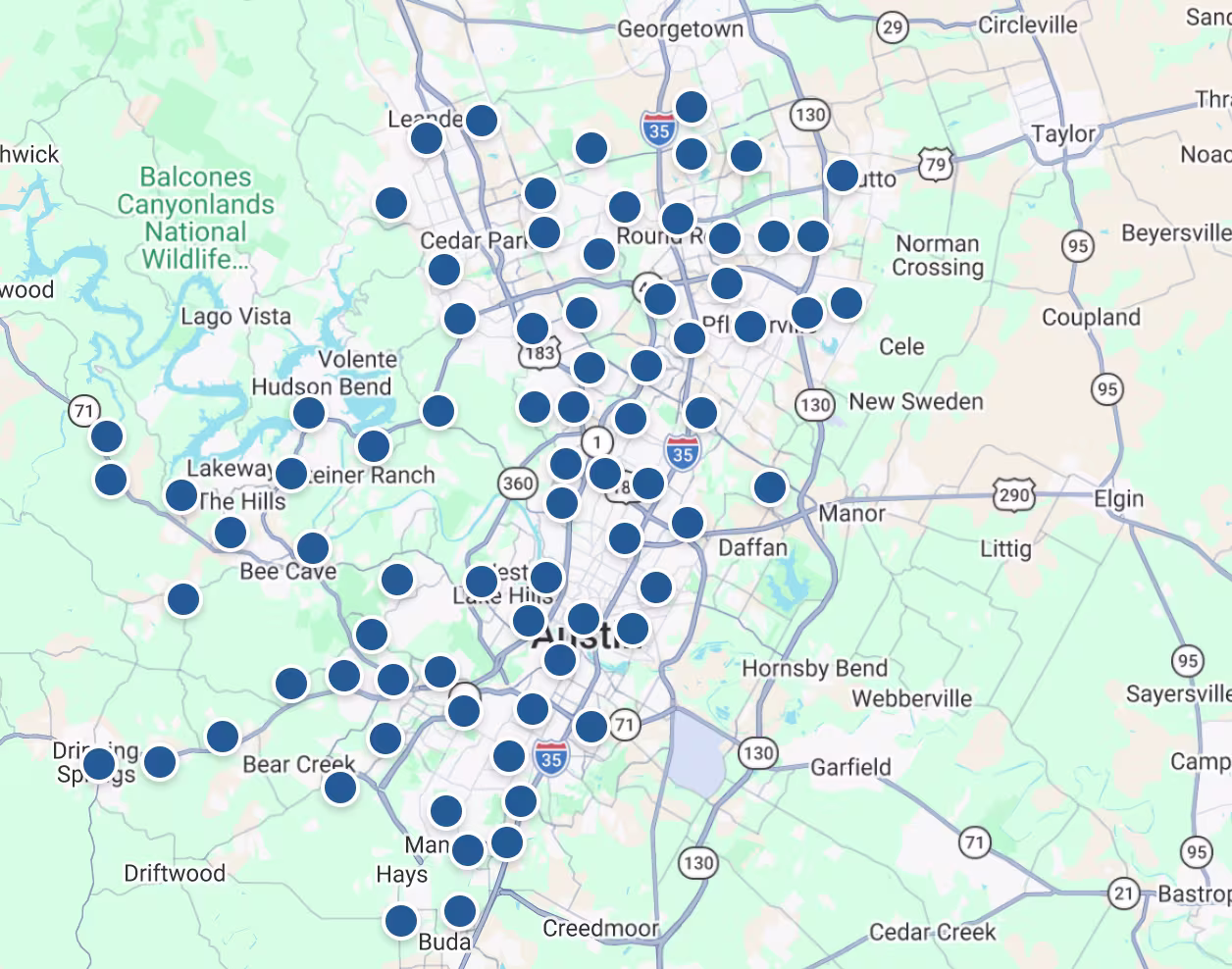 A screenshot of a Google map with blue dots on it.