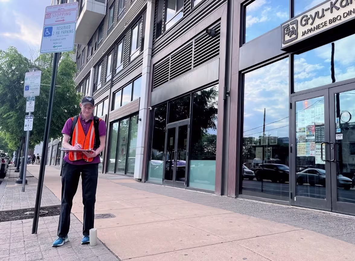 City planner outside a building