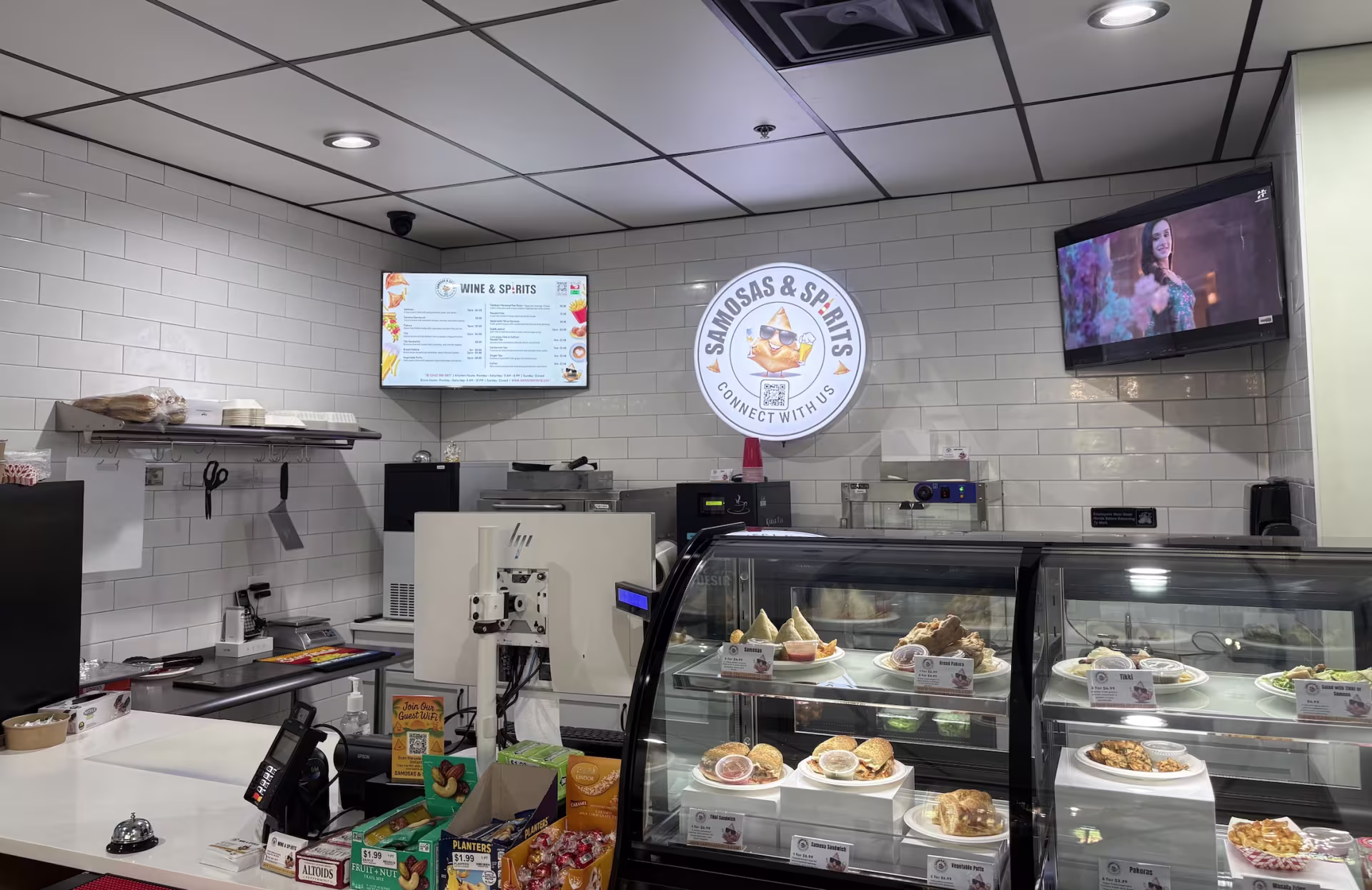 Samosas & Spirits counter at the back of a liquor store. (Ashe Durban/City Cast DC)