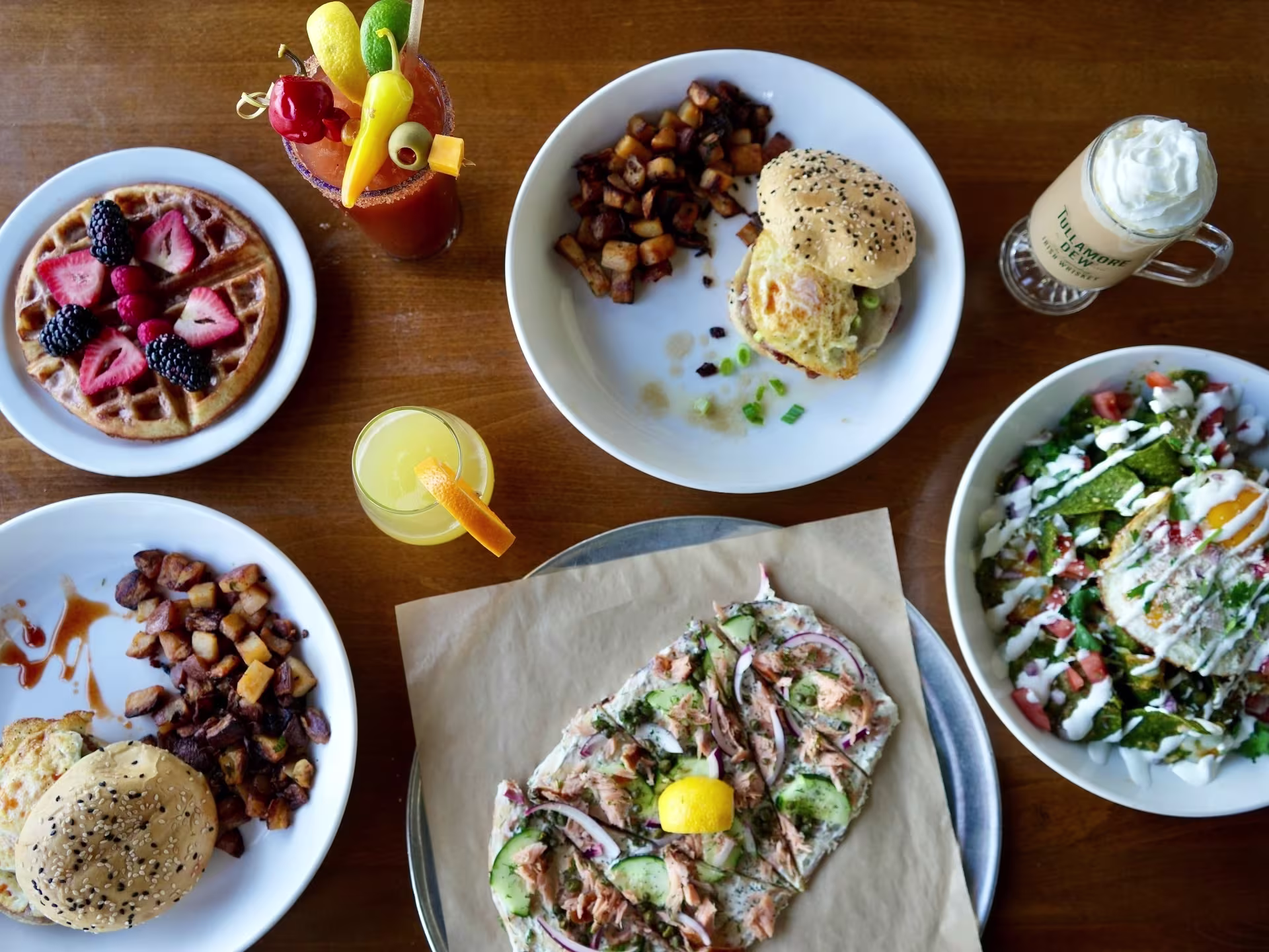  Brunch with assorted food and drinks on table.