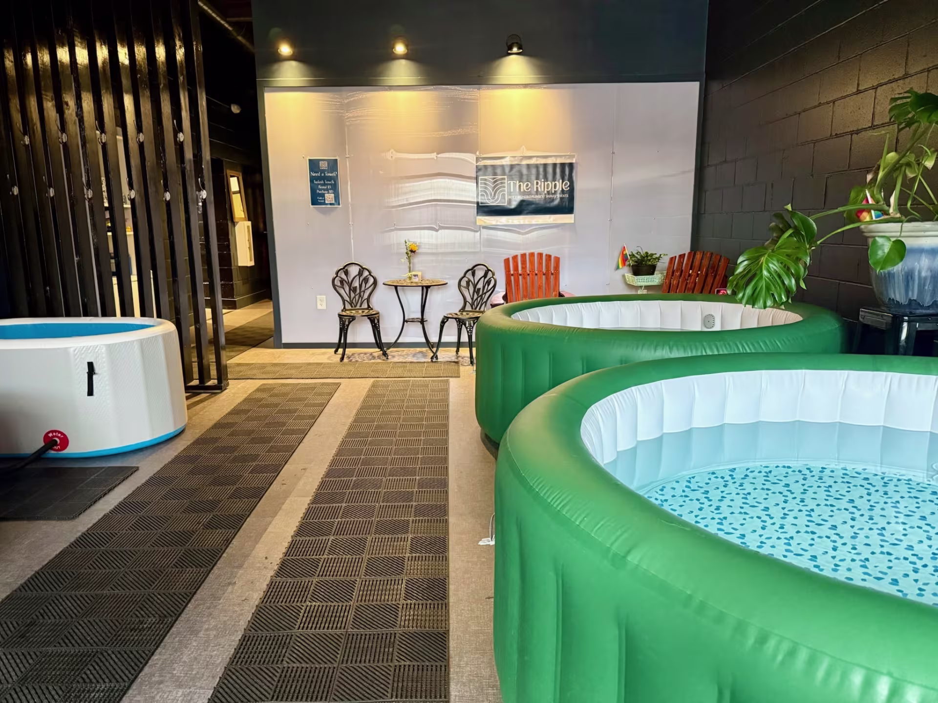 a room with hot tubs and cold plunges