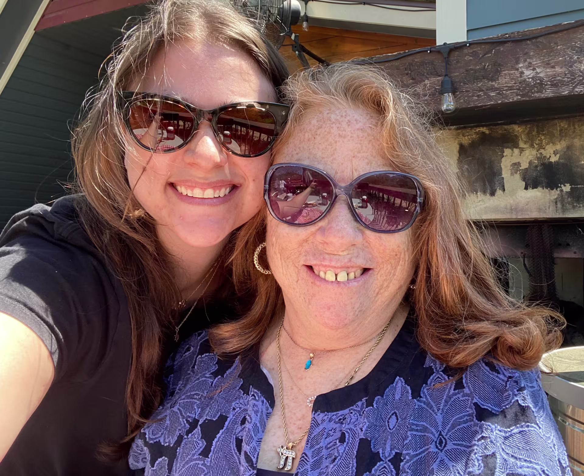 Two women smiling for a photo.