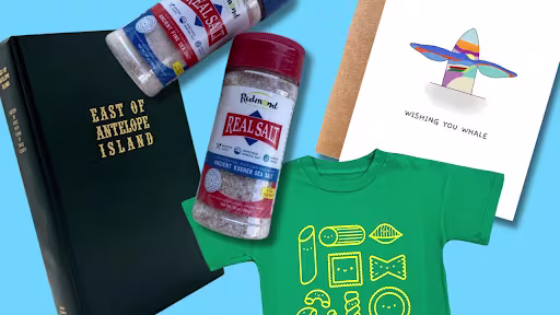  A flat-lay of gift items on a blue background