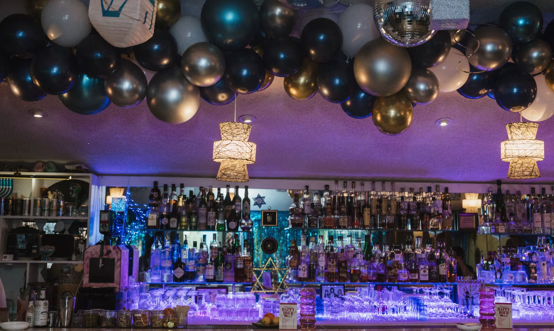 A bar with blue decorations around it. 