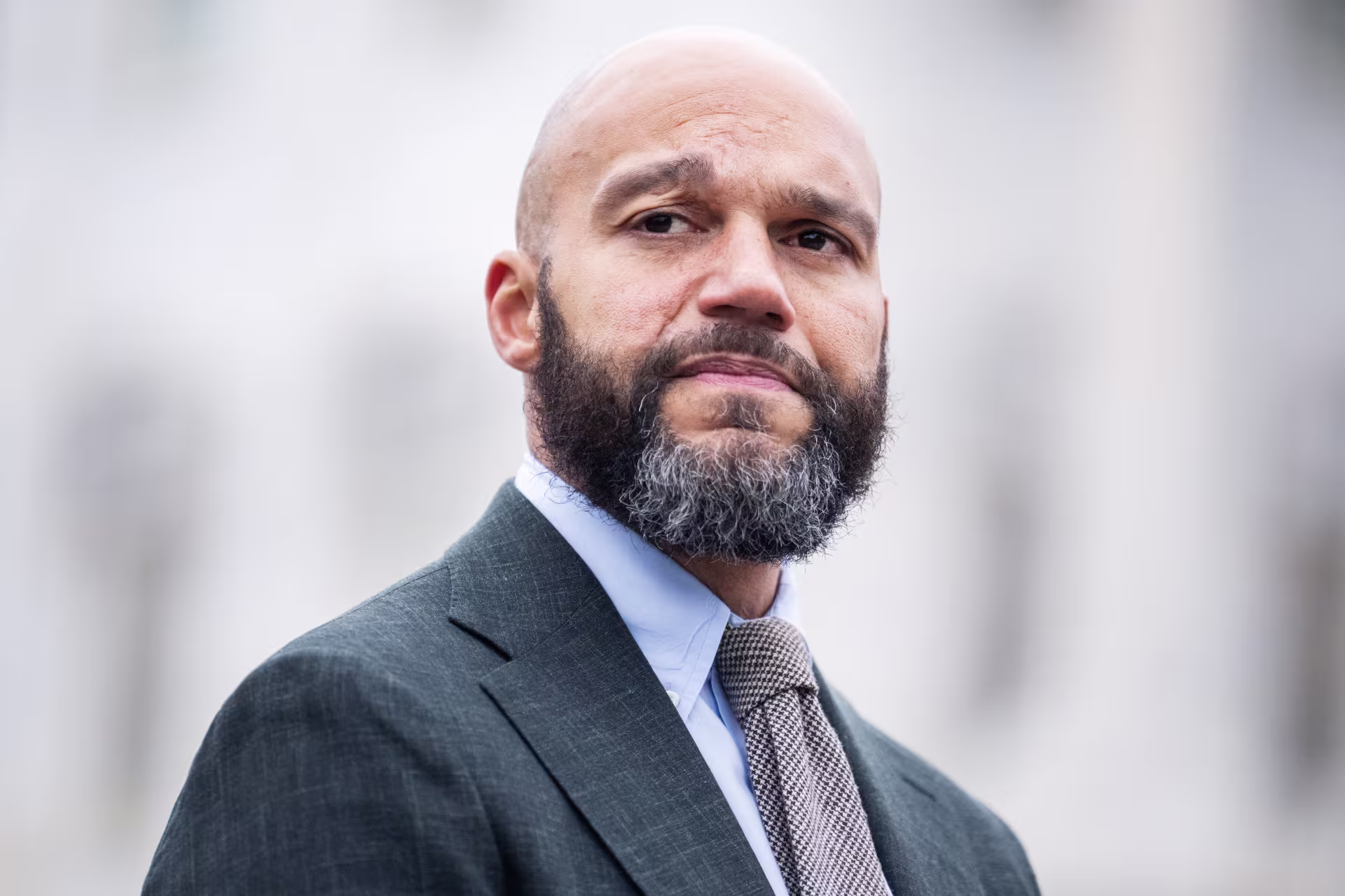 D.C. Councilmember Robert White attends a news conference.