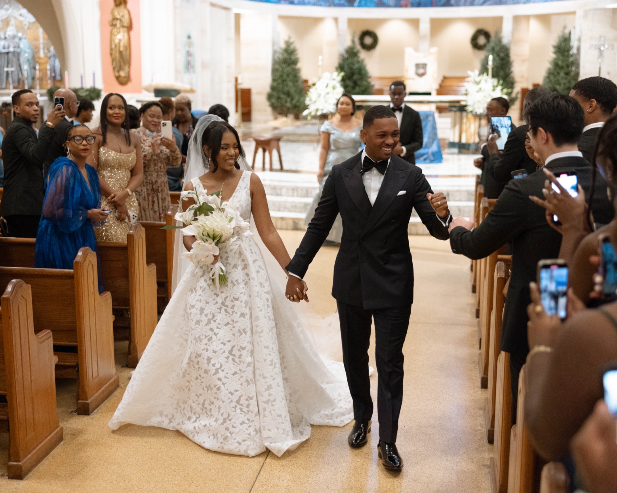The newlyweds walking back down the aisle