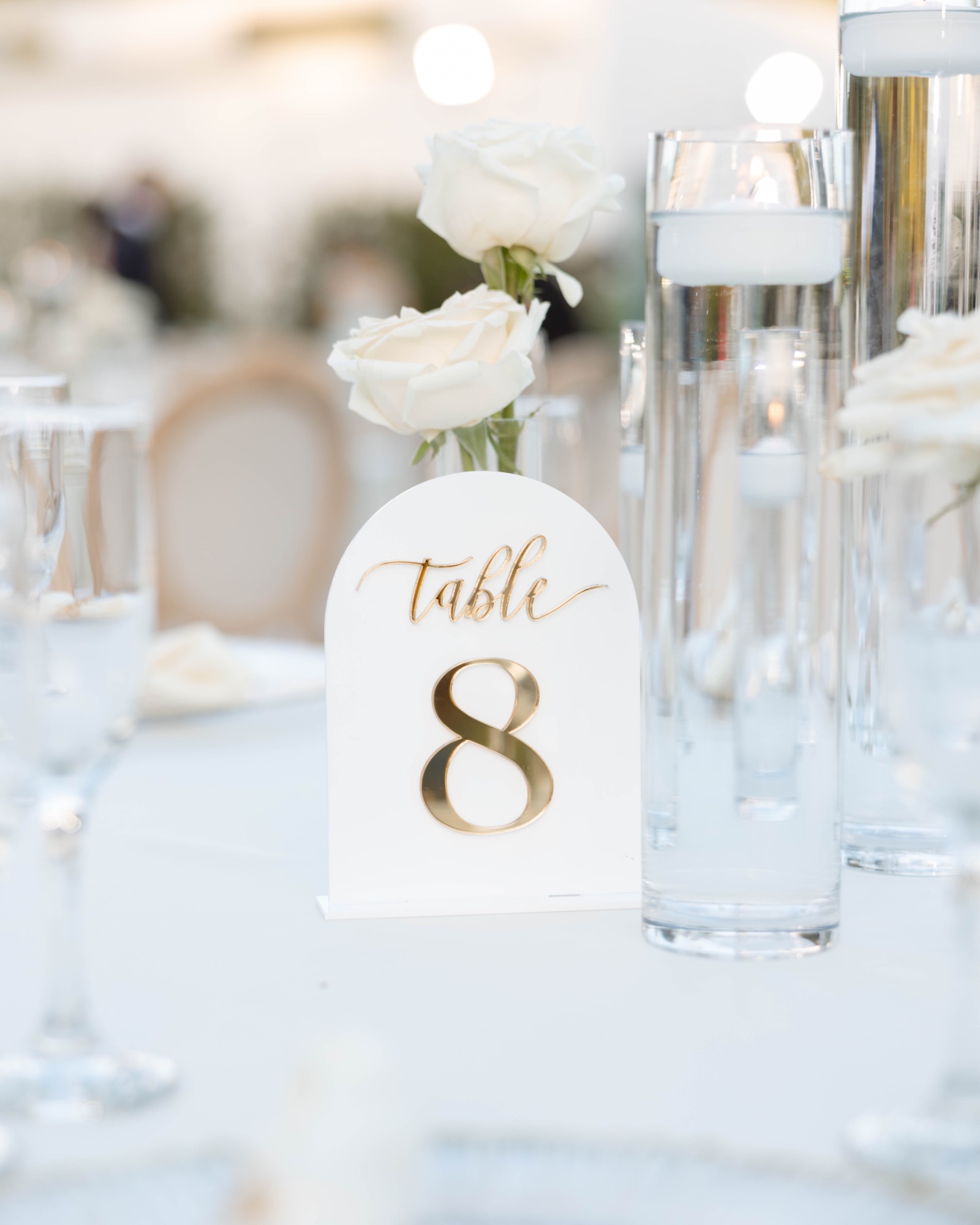 The table eight marker among tapered candles