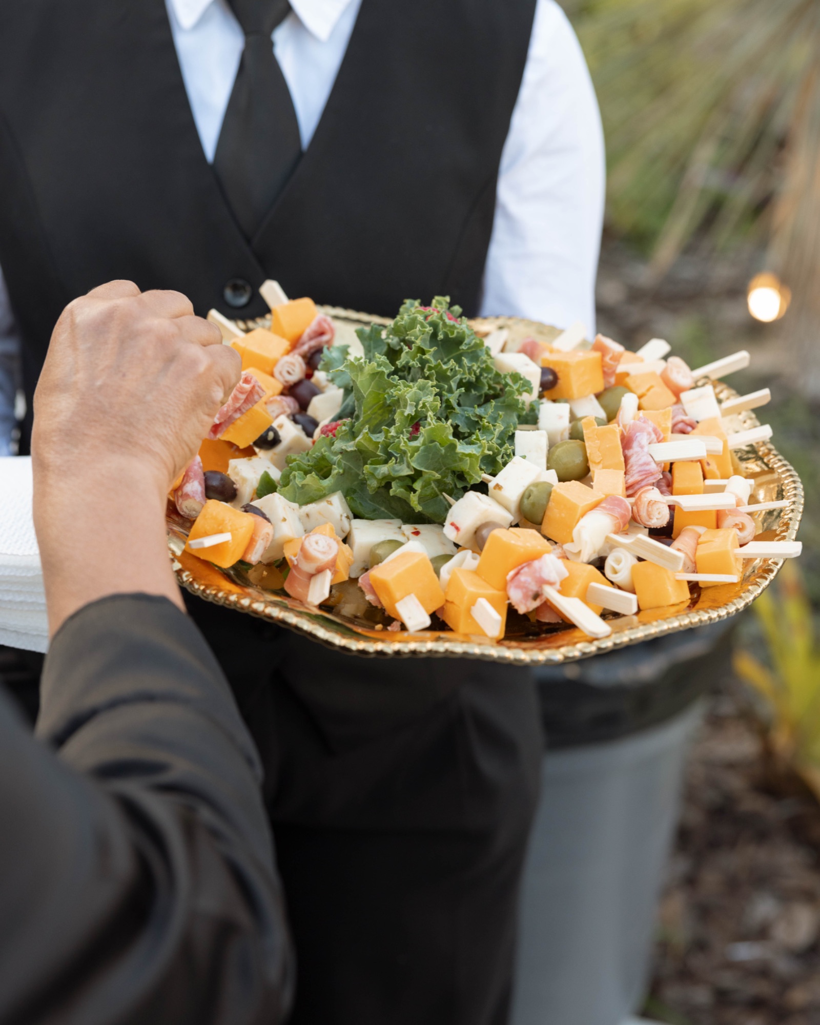 A tray of hors d'oeuvres carried through cocktail hour