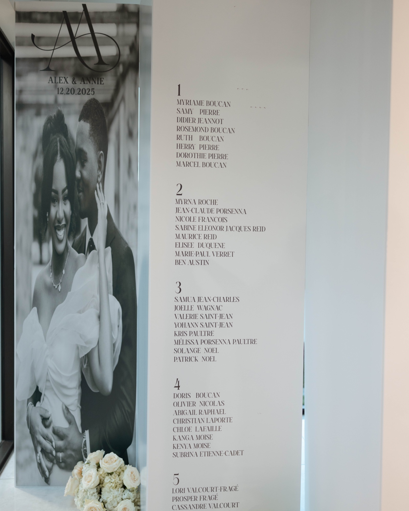 The seating chart with the couple's portrait
