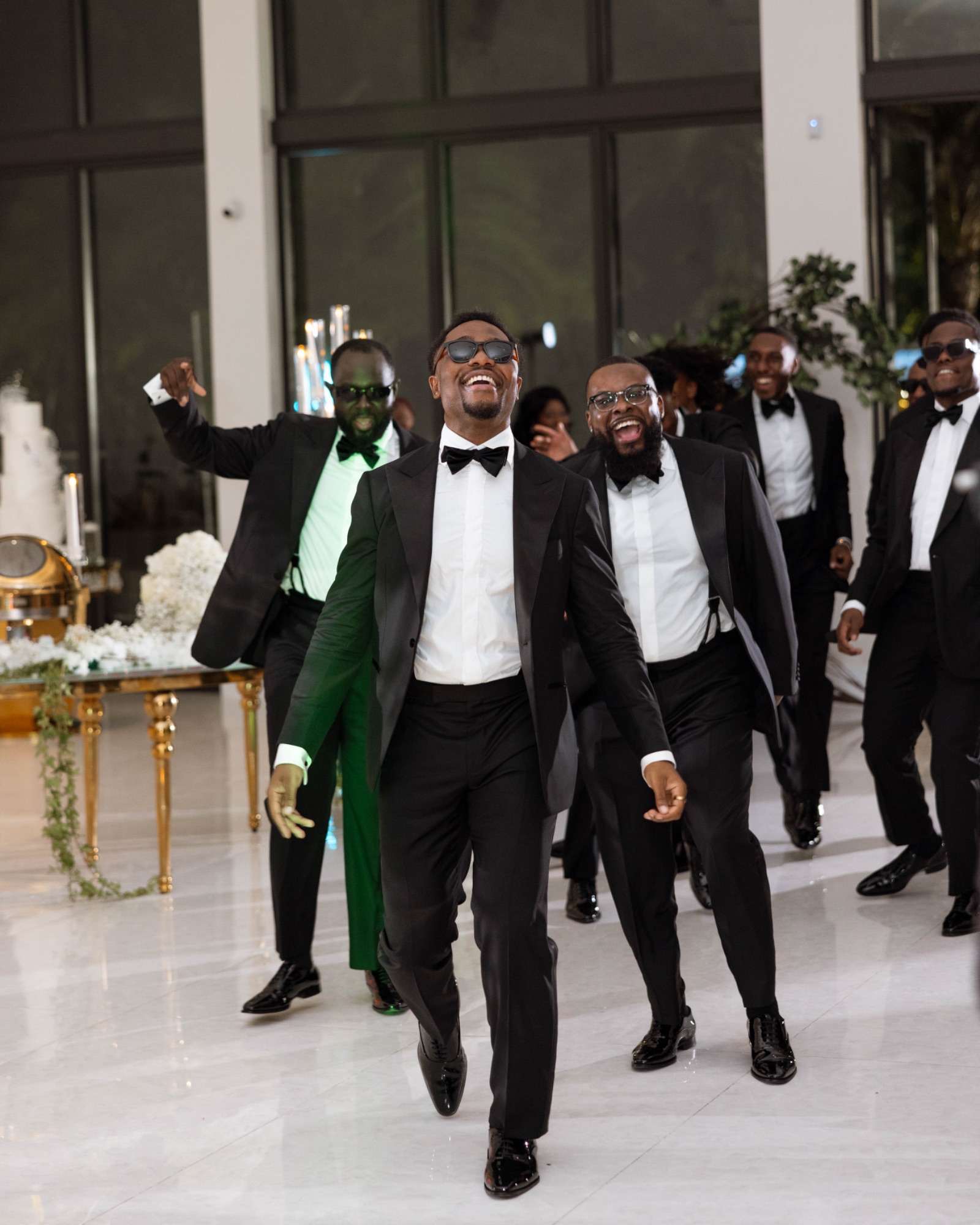 The wedding party entering the reception