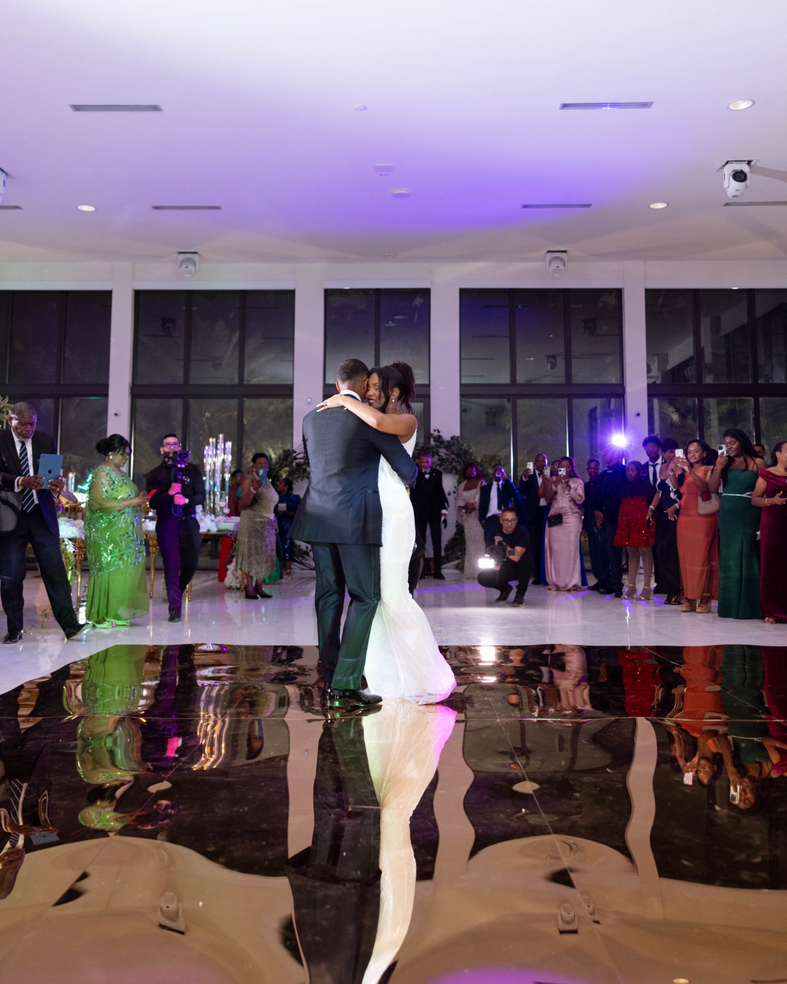 The first dance, reflected in the mirrored floor