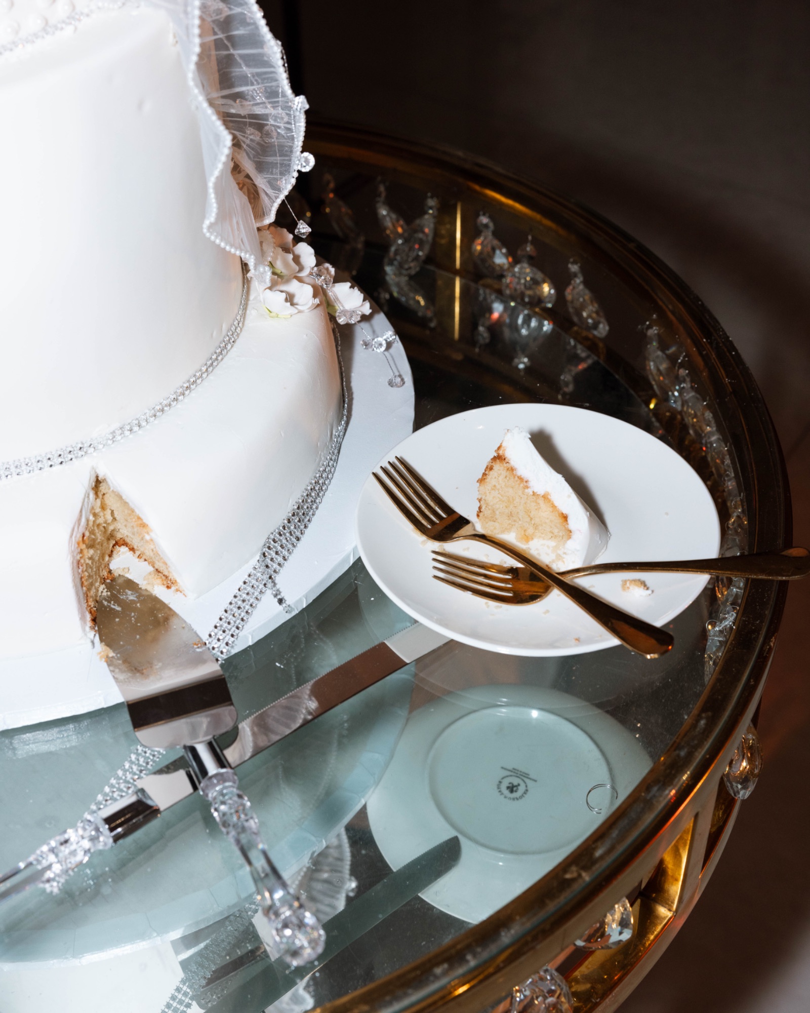 The first slice of the wedding cake