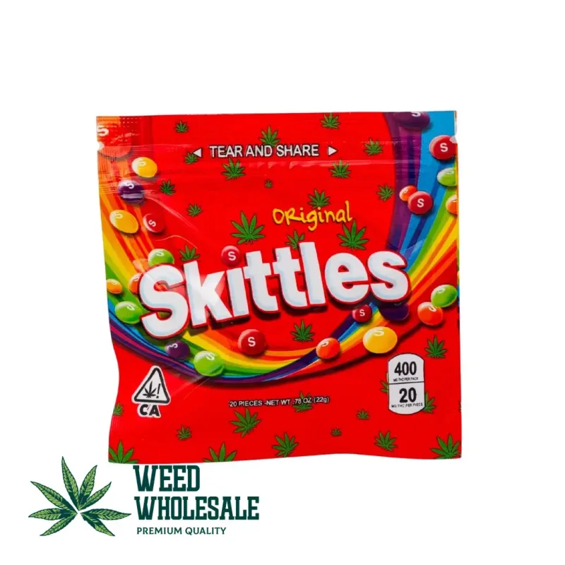 Packaging of Skittles Original 400MG THC gummies featuring colorful rainbow candy-style pieces with fruit flavors and THC labeling on the front of the bag.