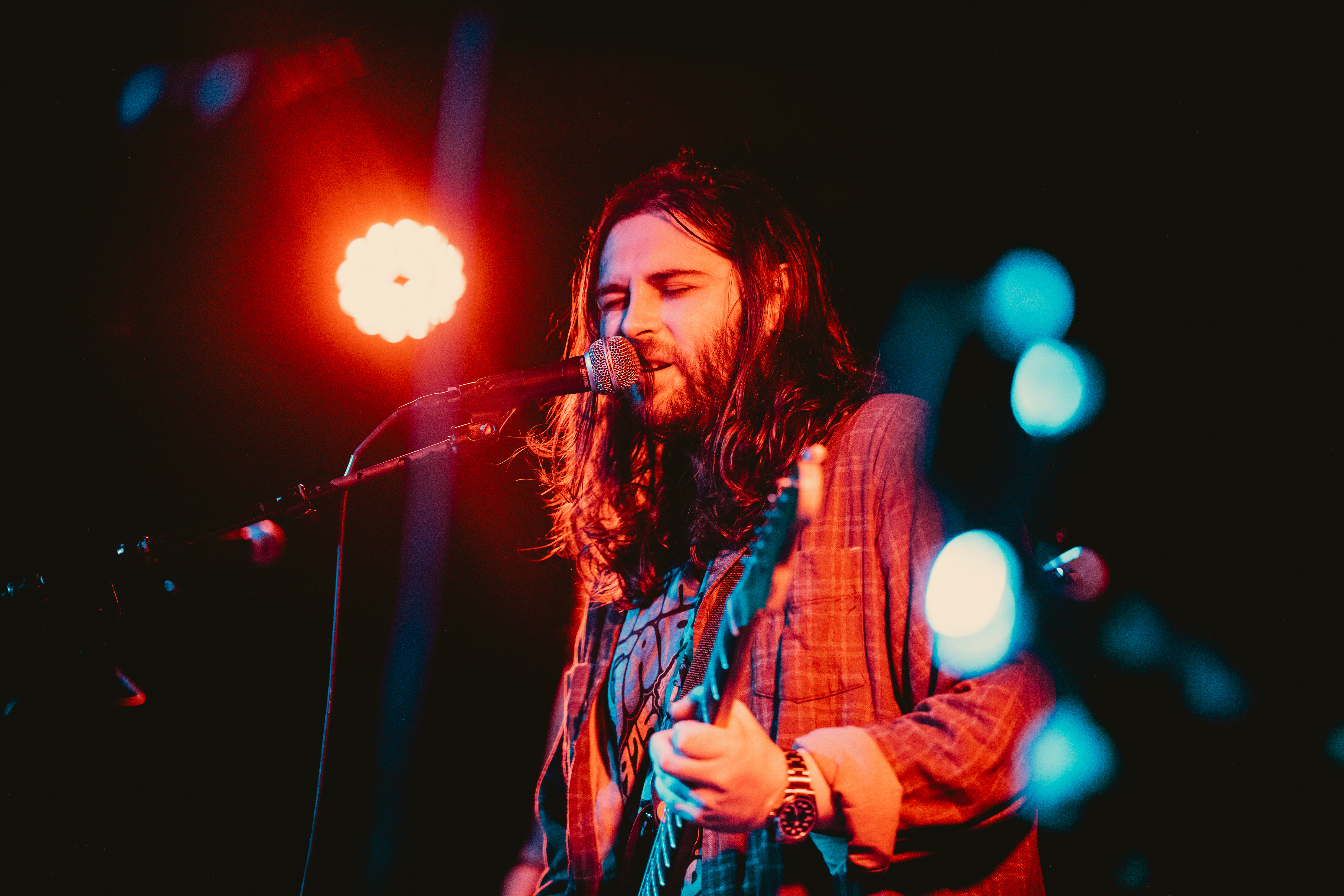 Zac Hoina — singer, songwriter and guitarist, live performance photo by Maddie Barkocy