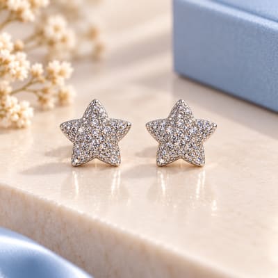 Elegant 925 silver dolphin studs with rose-gold plating and sparkling pavé stones. A playful, graceful design perfect fo