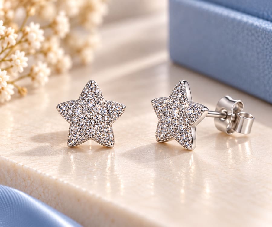 Elegant 925 silver dolphin studs with rose-gold plating and sparkling pavé stones. A playful, graceful design perfect fo