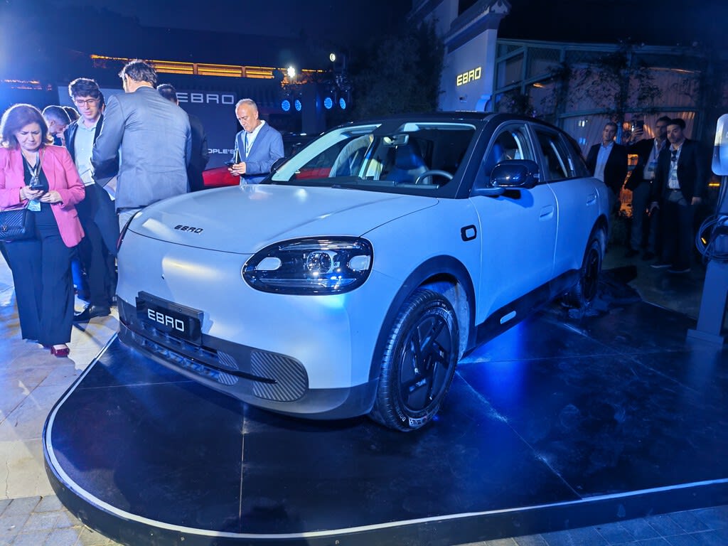 Ebro electric car prototype on display in a modern showroom