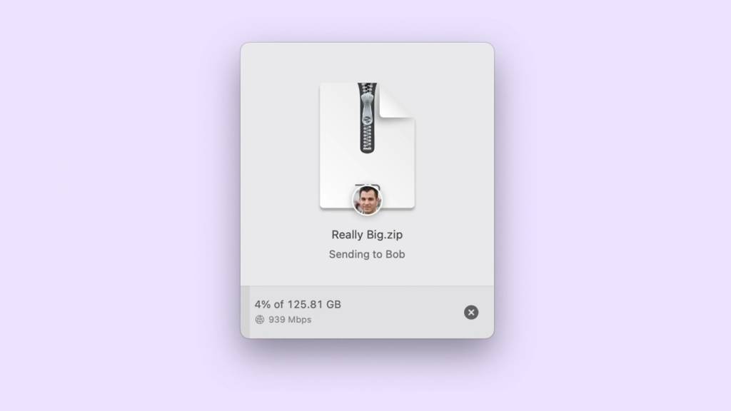 Captura de pantalla abstracta mostrando iconos de transferencia de archivos en movimiento rápido entre diferentes dispositivos, simbolizando velocidad y conectividad multiplataforma.