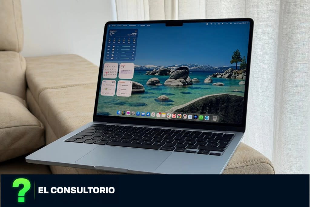 MacBook Air M5 con pantalla mostrando código de programación y gráficos de IA abstractos.