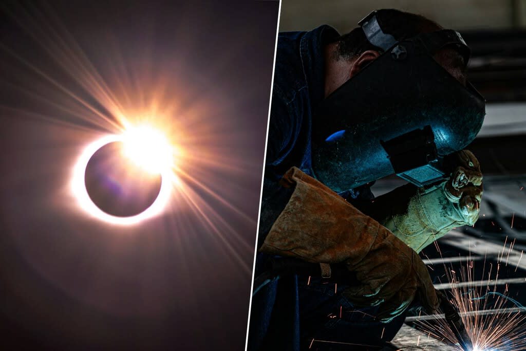 Persona observando un eclipse solar a través de un cristal de soldador de nivel DIN 14.