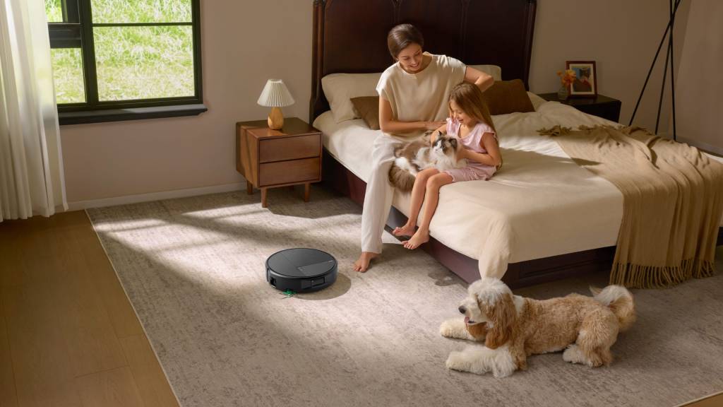 Robot aspirador iRobot Roomba Max 875 Combo en funcionamiento en una sala de estar moderna.