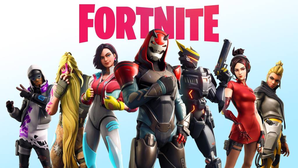 Laptop con el logo de Fortnite en la pantalla, sobre un escritorio con ambientación gamer.