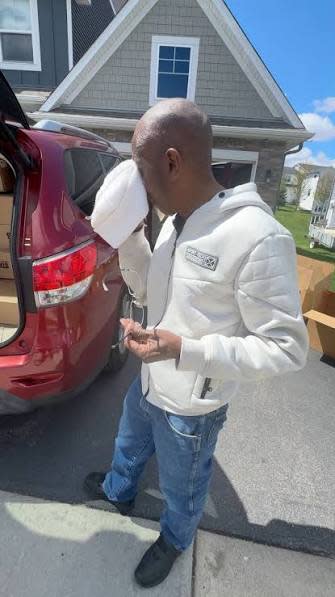 Recipient wearing STAND+ shoes during Josh Liljenquist’s community shoe distribution project.
