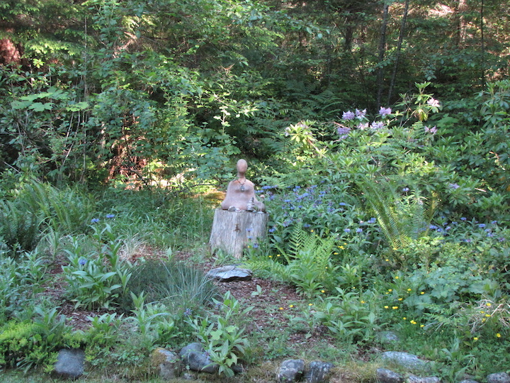 Inannas Shrine is surrounded by a stunning mix of flowers and local vegetation