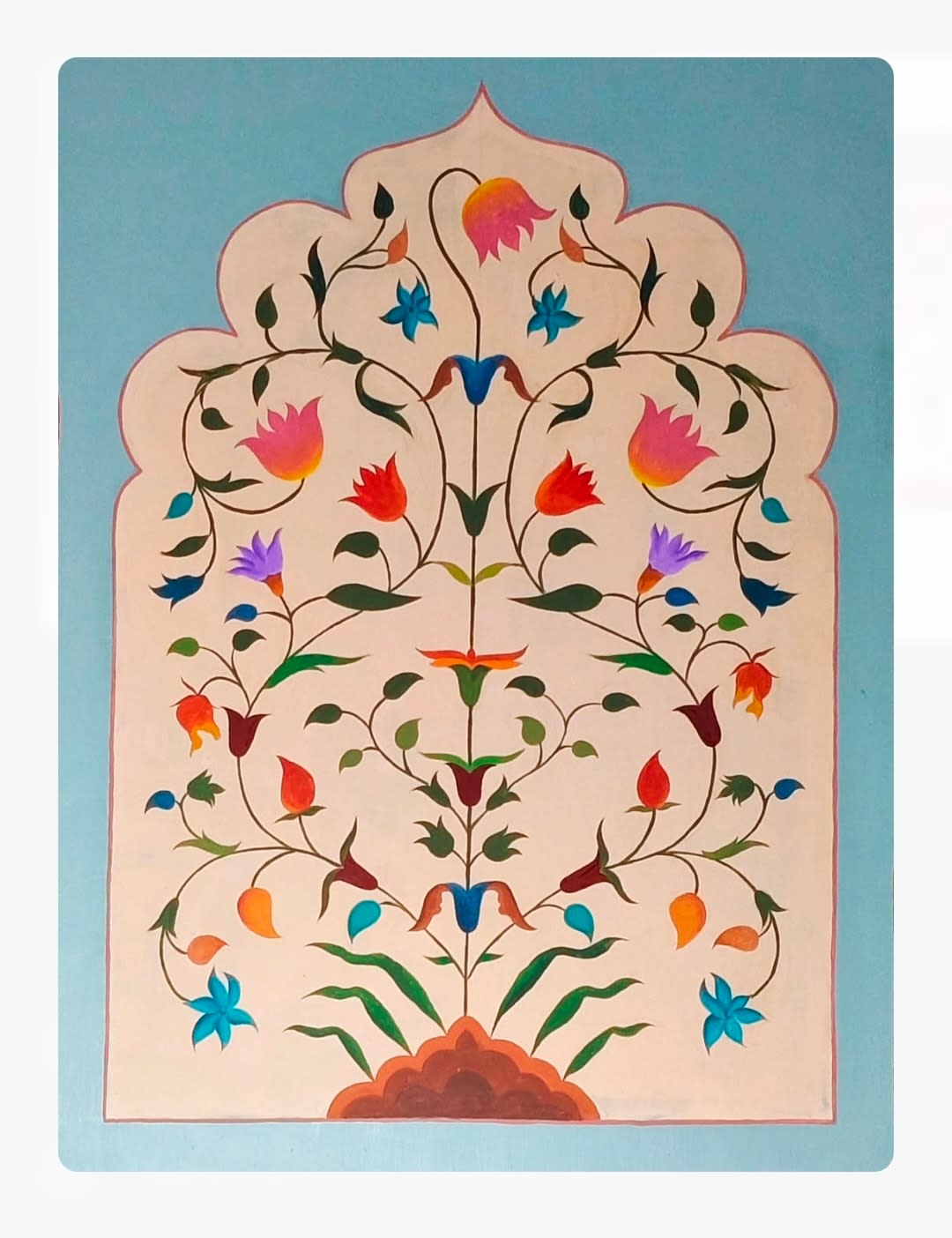 A vertical painting of a symmetrical floral vine in a Mughal arch, with vibrant colorful flowers on a soft cream ground.