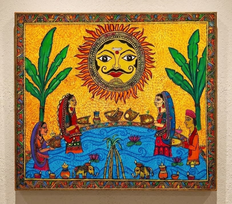 A vibrant Madhubani painting of Chhath Puja featuring a sun deity above figures in water, surrounded by banana leaves and lamps.