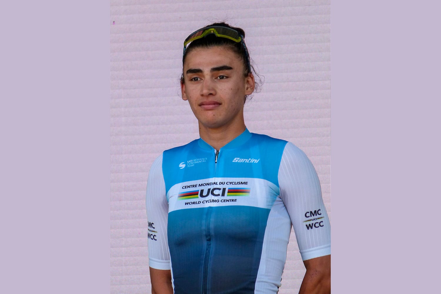 Yulduz Hashimi, Fariba's older sister and fellow professional, at the team presentation for the 2024 Tour Cycliste Féminin International de l'Ardèche in France. The sisters began racing together in secret in 2017.
