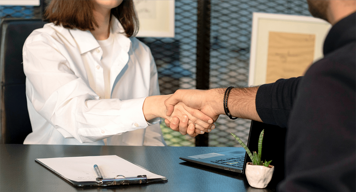 two people shaking hands