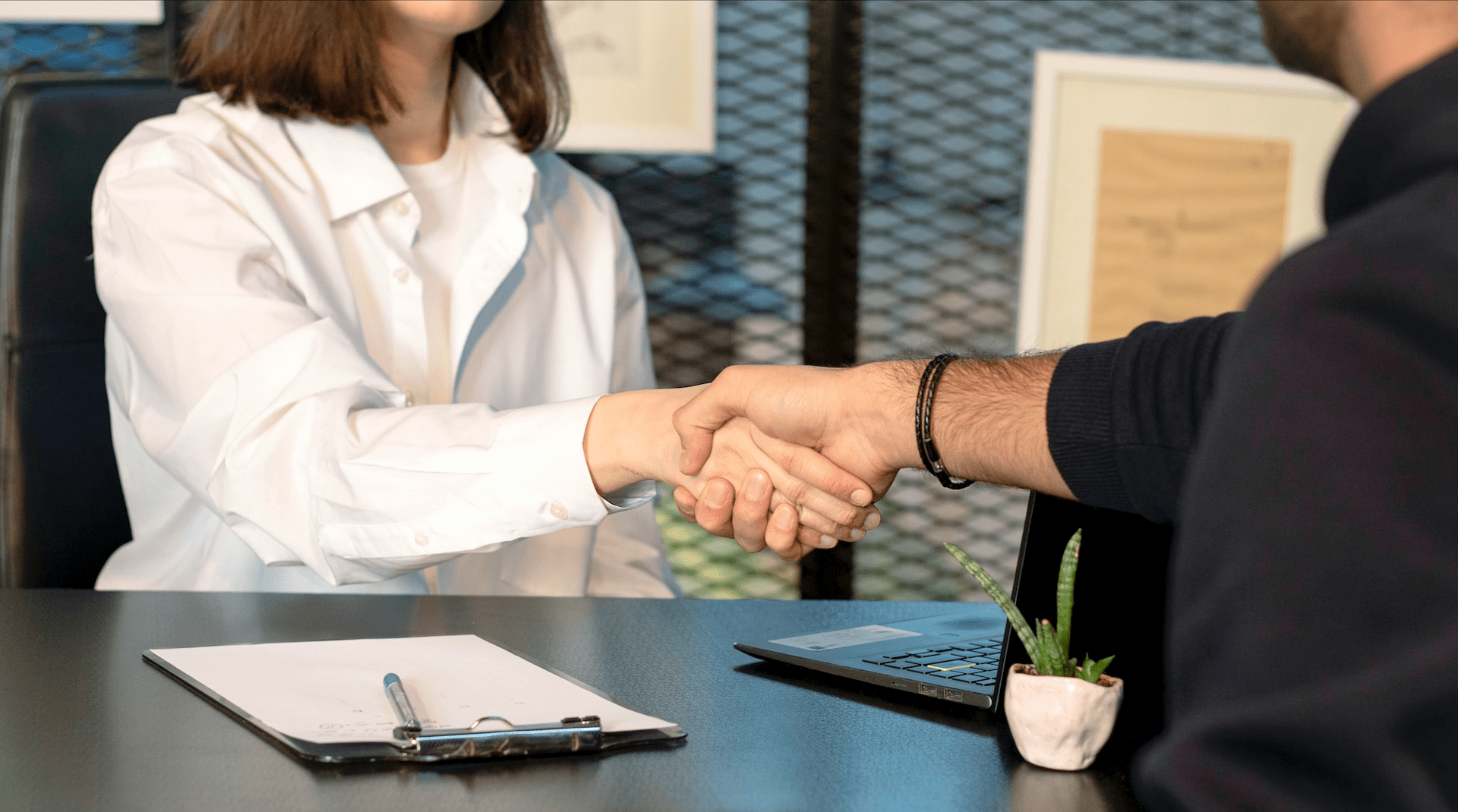 two people shaking hands