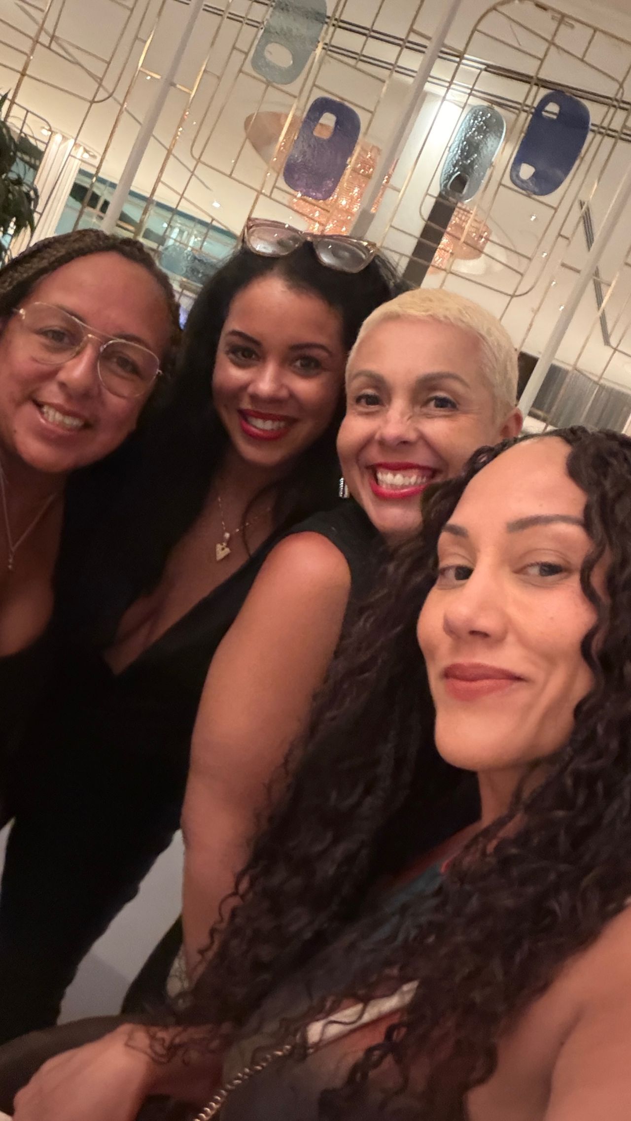 Four women smiling for a selfie at NAMAD 2026.