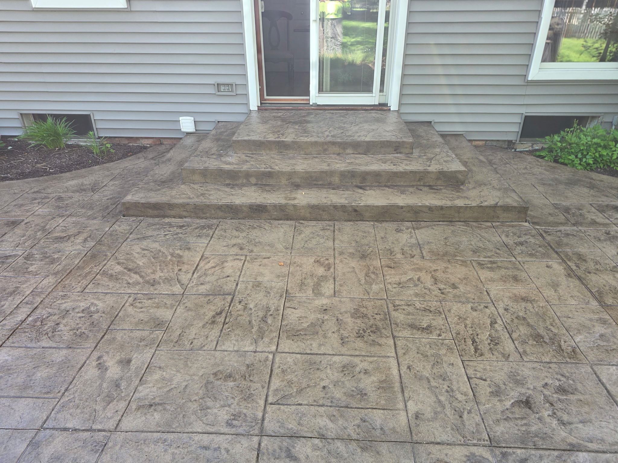 Slate pattern stamped concrete patio in Chagrin Falls