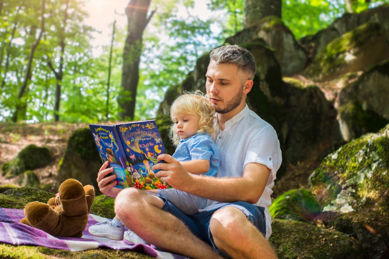 Infant exploring a sensory book, developing early literacy skills