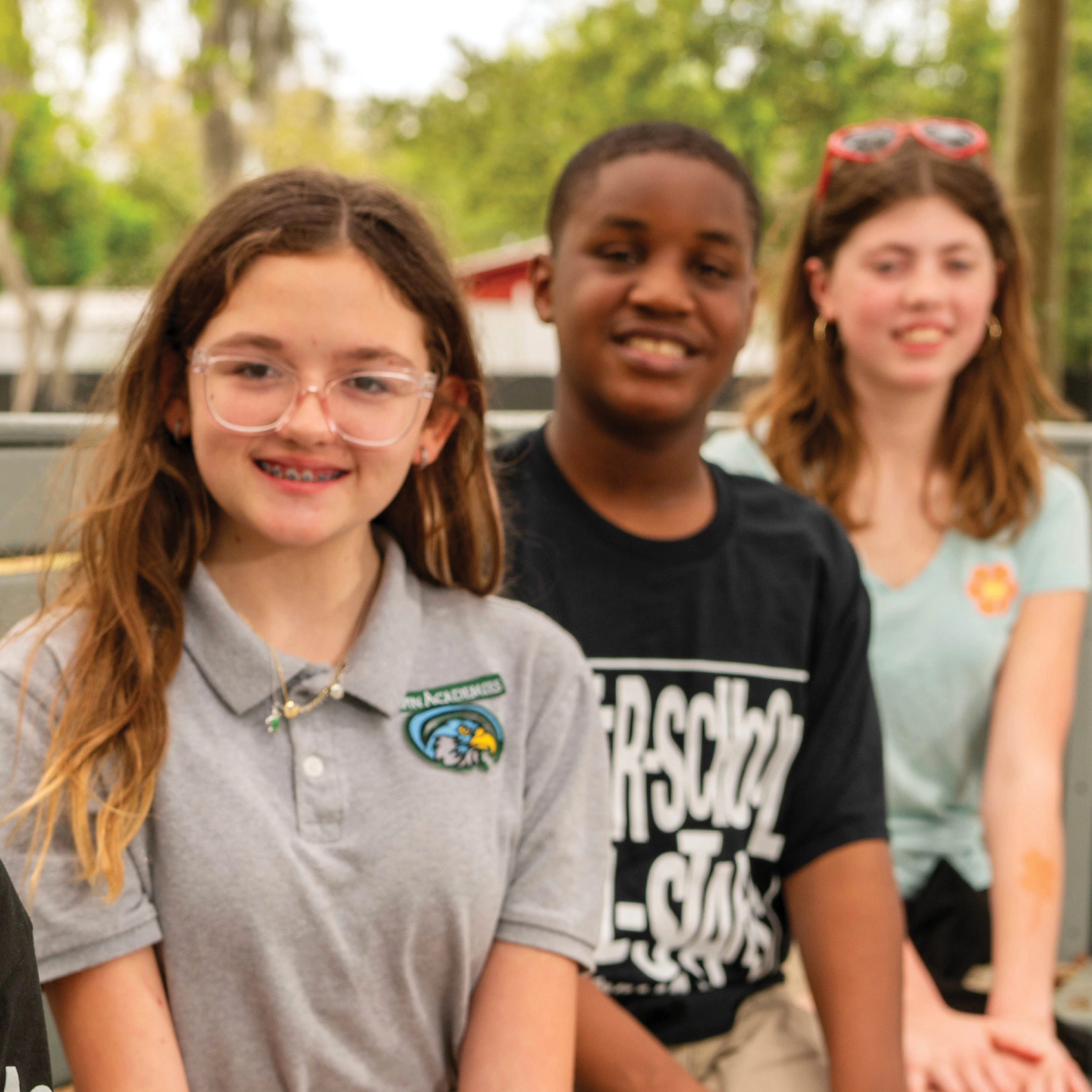 home page hero Set A1 ASAS Tampa students outside square for mobile