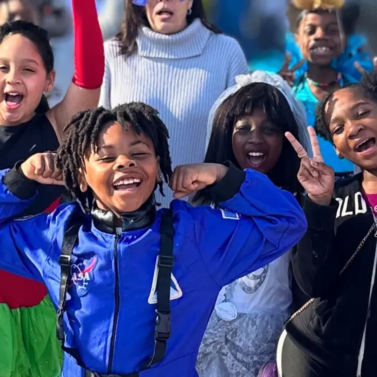 A large group of students pose together for a photo