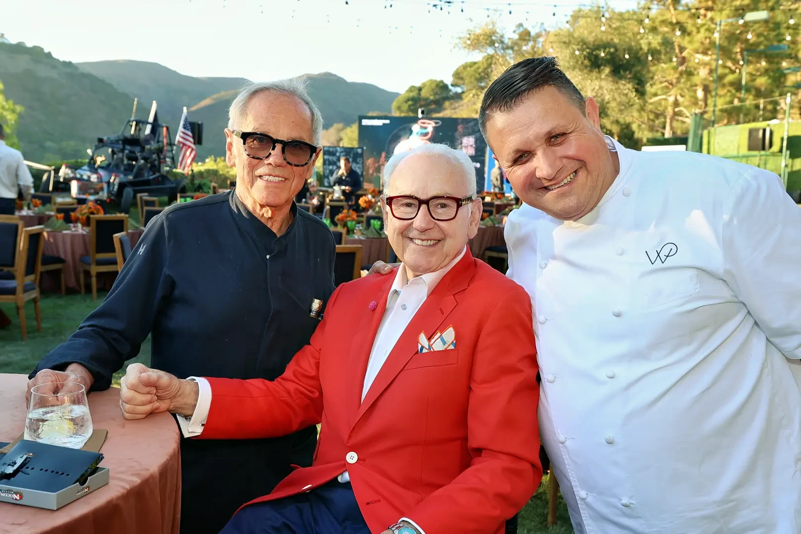 three men posing for a picture