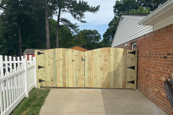 Treated Arch Top fence by Kempsville Fence in Hampton Roads