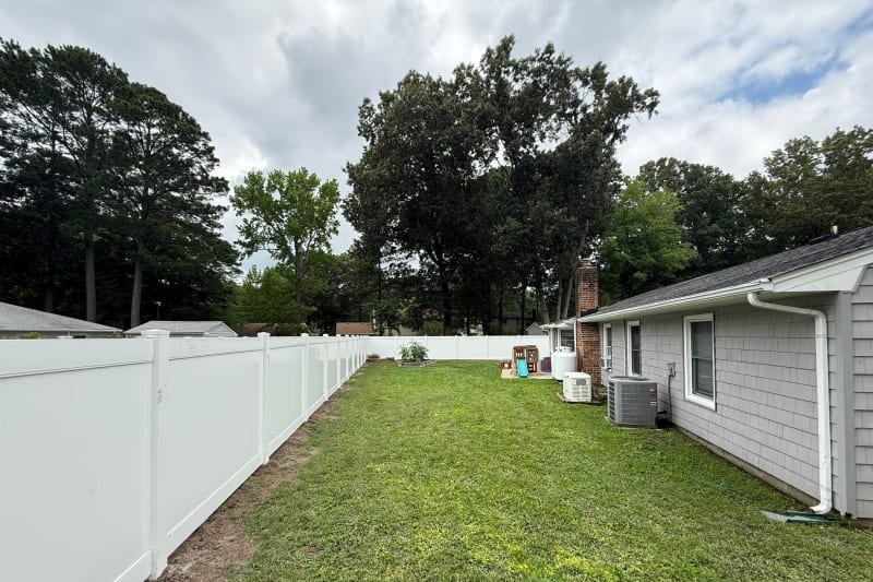White vinyl privacy fence in Virginia Beach VA by Kempsville Fence — photo 5