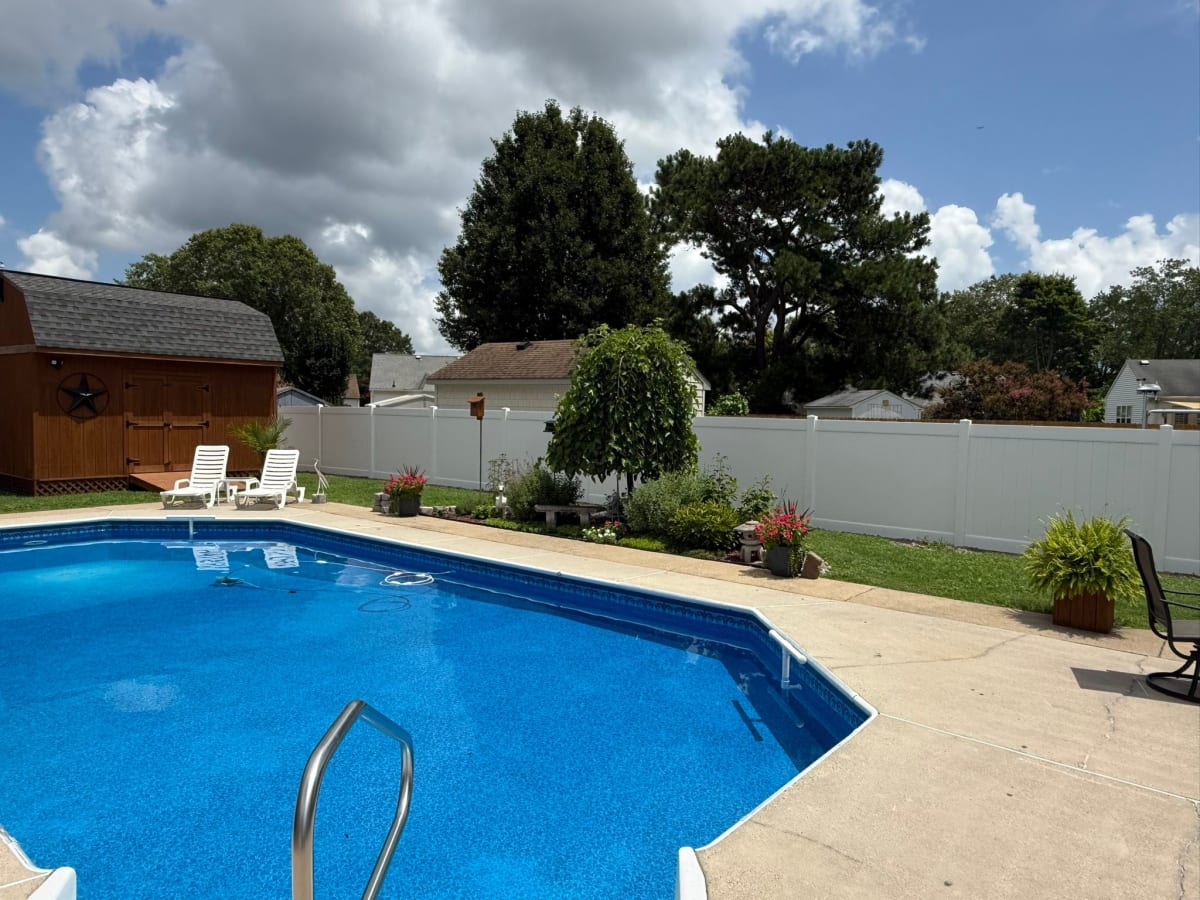 Vinyl privacy fence installed in Chesapeake VA to secure pool and provide backyard privacy by Kempsville Fence