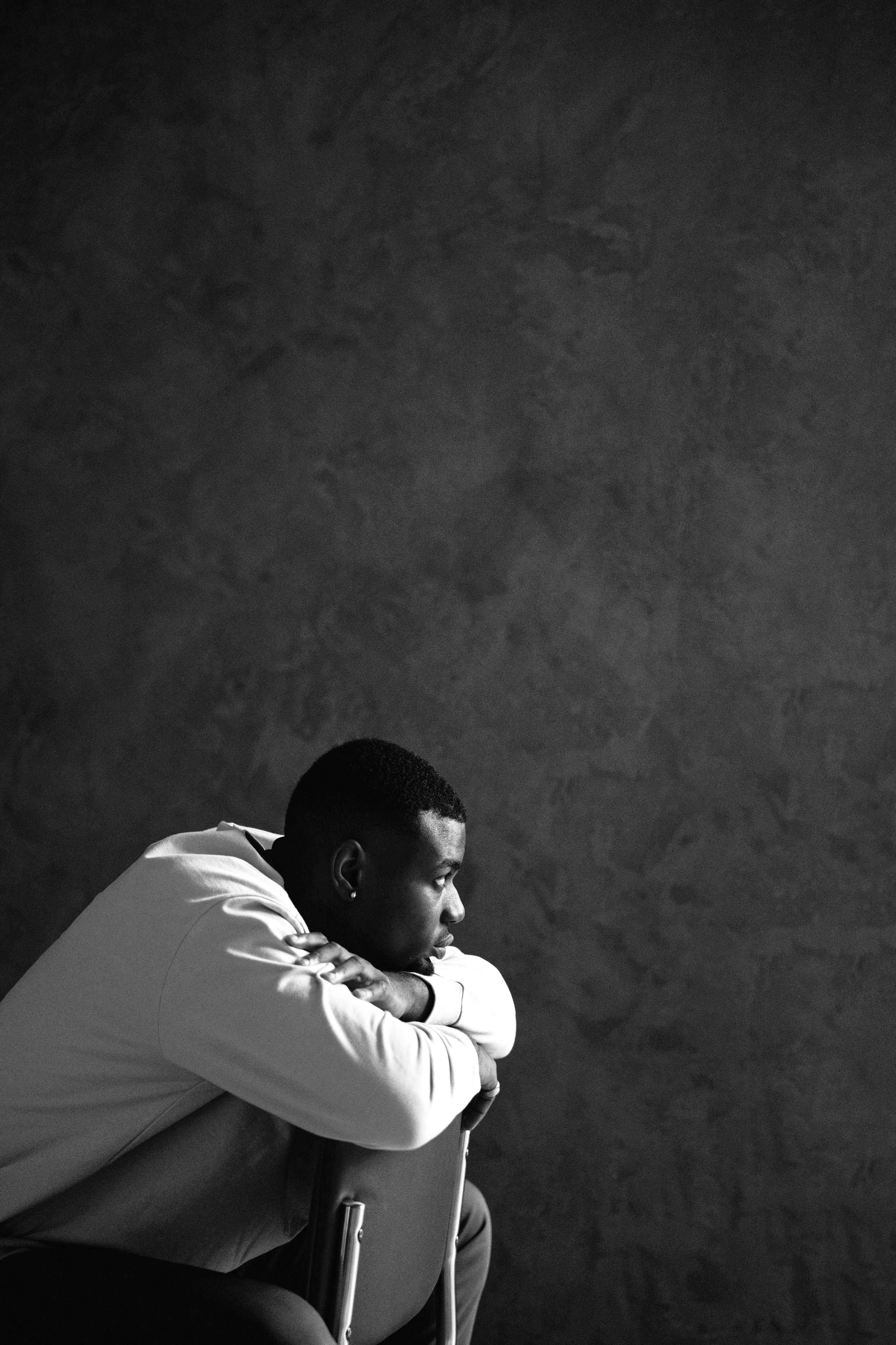 Person reflecting with journal in peaceful setting