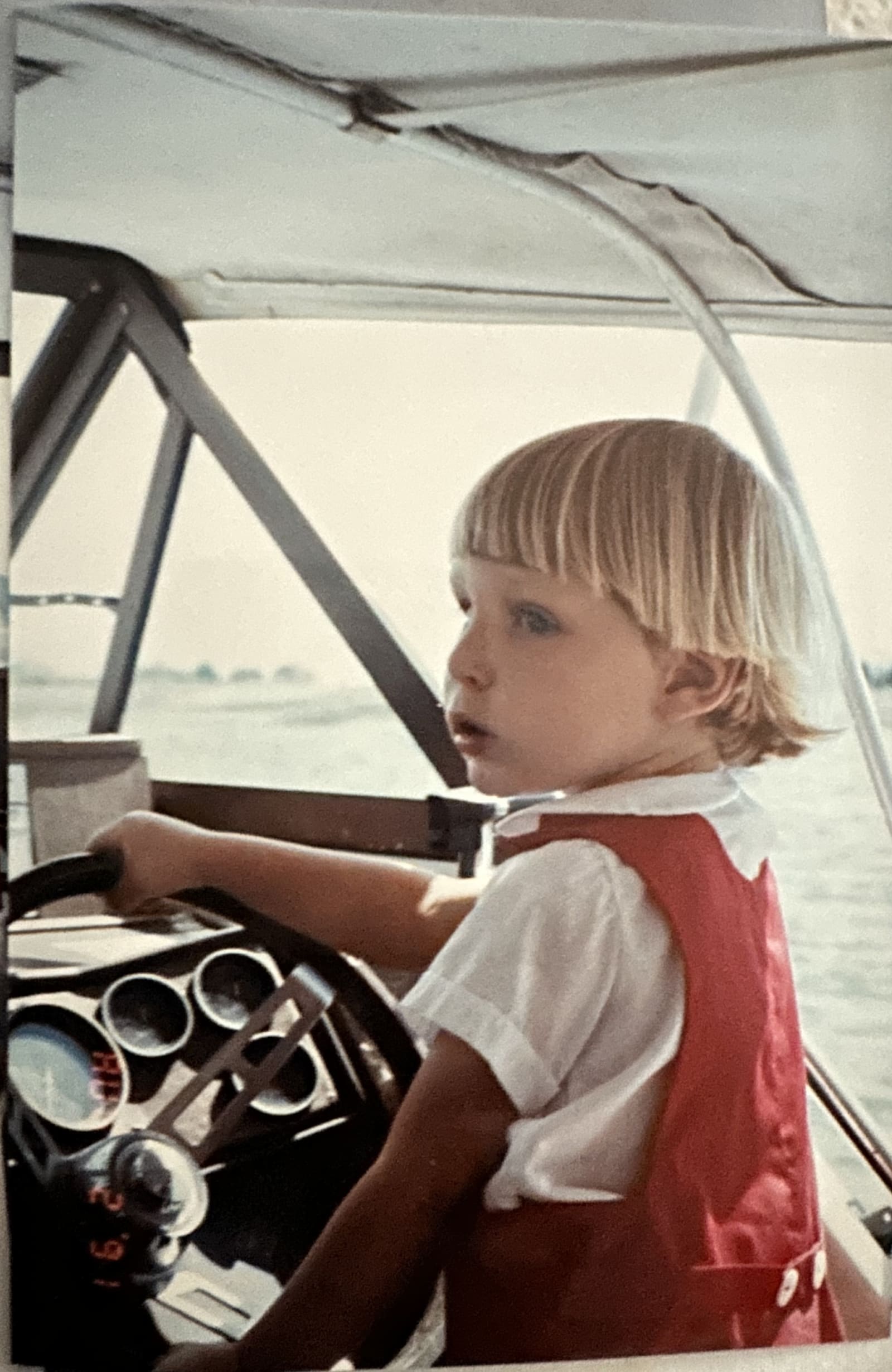 The editor-in-chief of ICW News at the helm, Boston Harbor - 1991