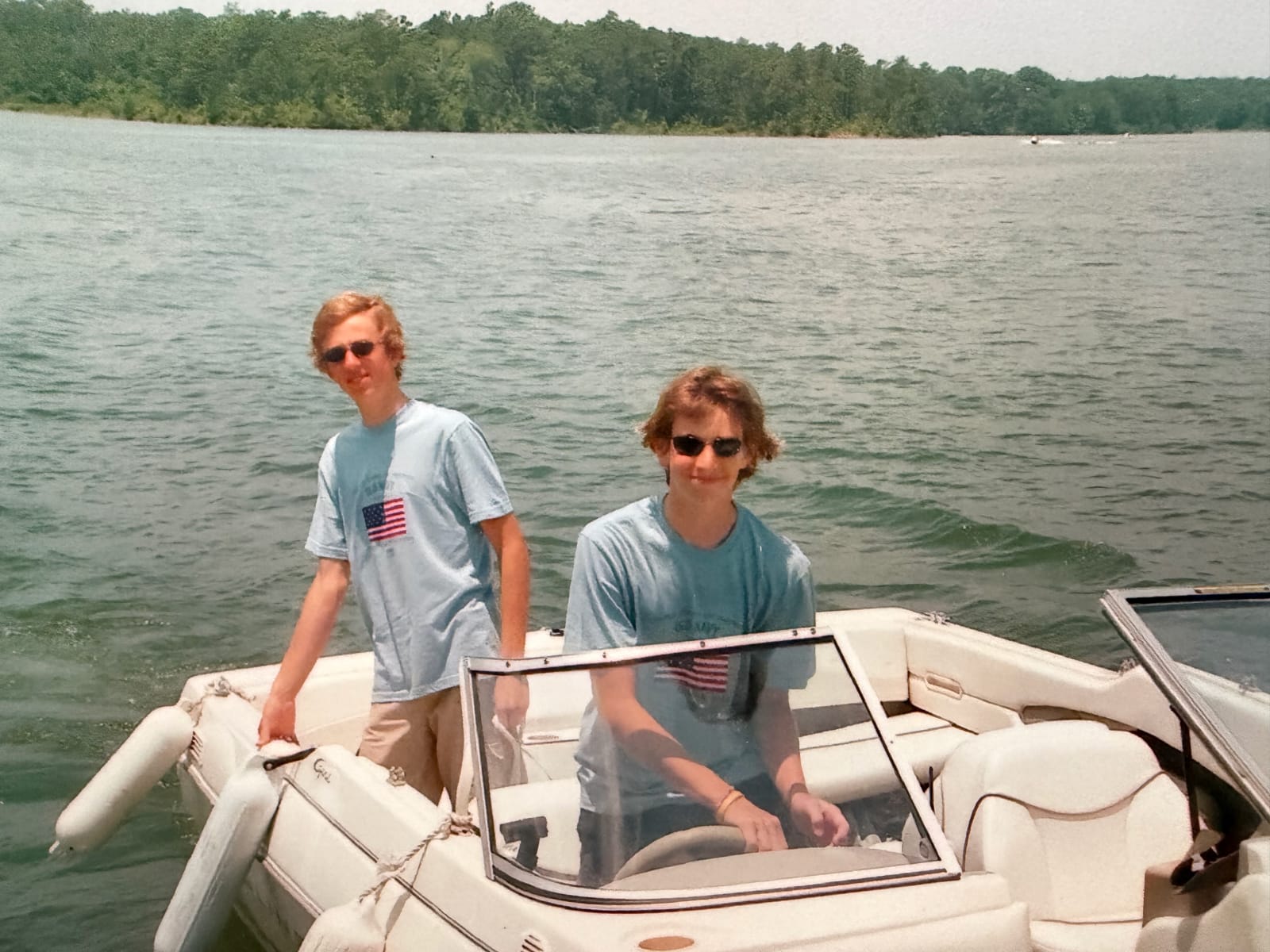 Summer 2005, West Point Lake, GA - At the helm with French exchange student Paul during July 4th weekend
