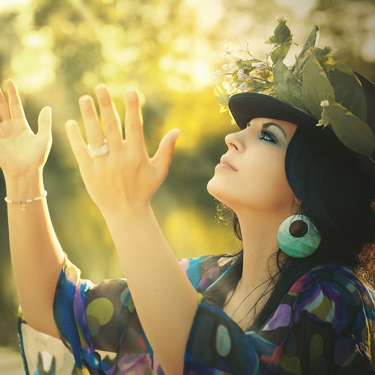 Beauty, woman, holding hands up, flowered hat