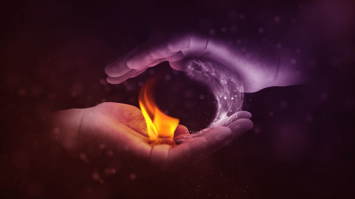 Hand holding fire and ice: Yin Yang